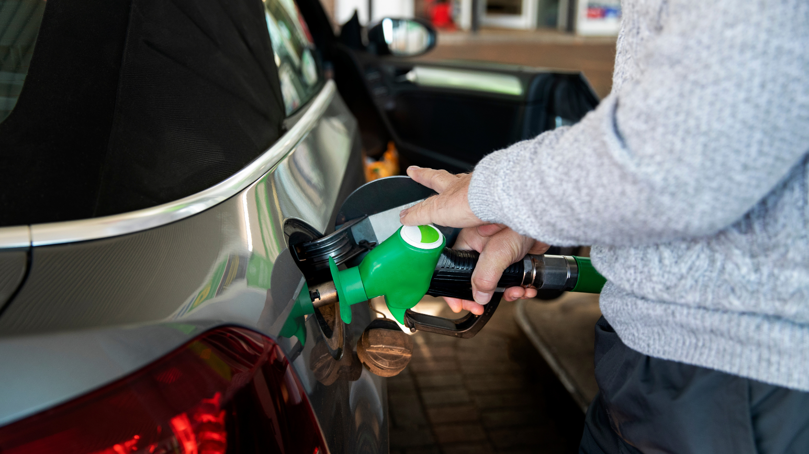 Man filling up car with petrol