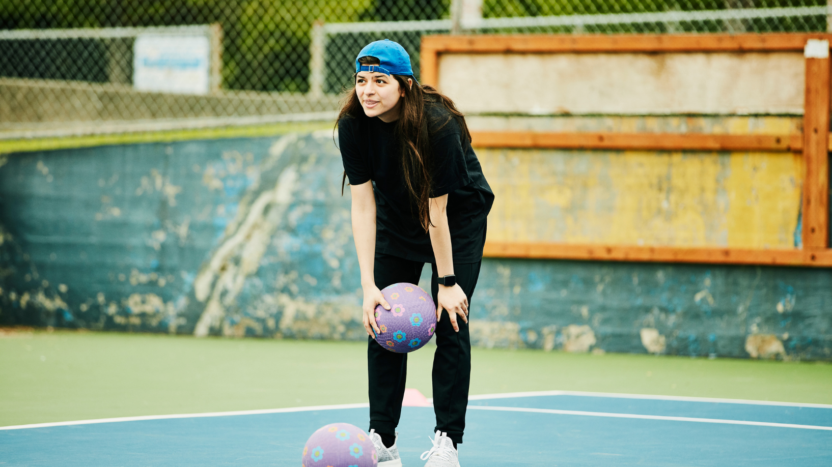 Girl playing dodgeball