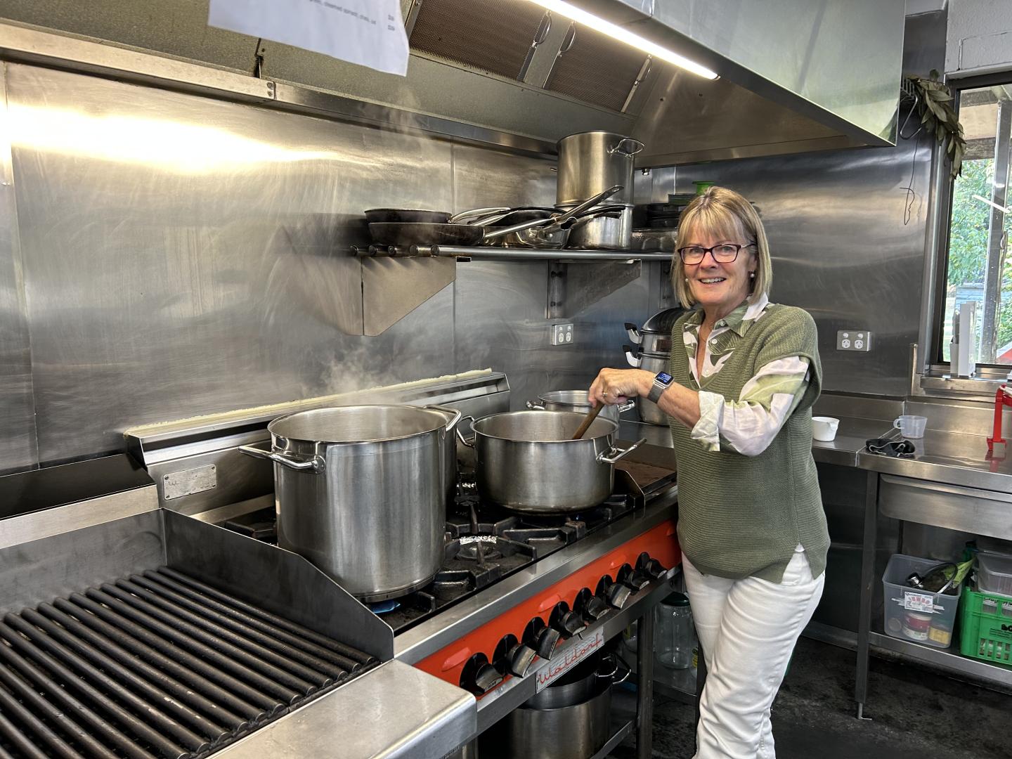 woman in front of gas top 