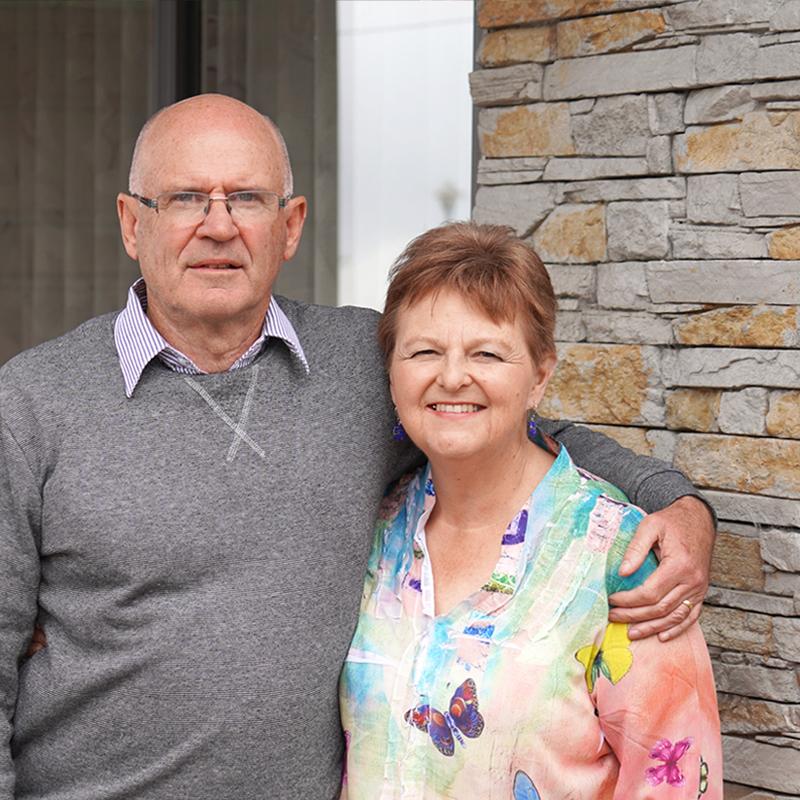 People looking at the camera and smiling