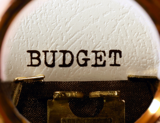 Photo of the word budget magnified via typewriter