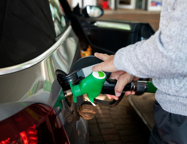 Man filling up car with petrol