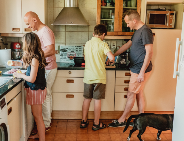 Family cooking in the kitchen. 