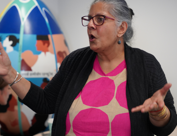 Lady speaking passionately and gesticulating