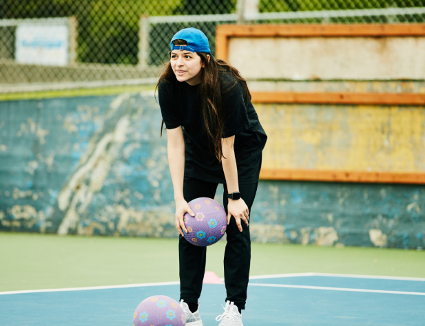 Girl playing dodgeball