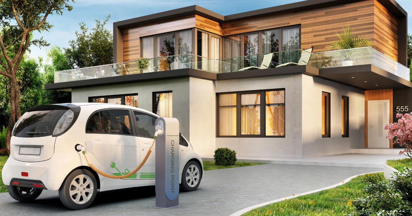Electric vehicle charging outside residential home